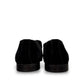 Sun Arash black suede slip-on loafers with subtle handmade stitching and a durable rubber outsole. Photo of back view.