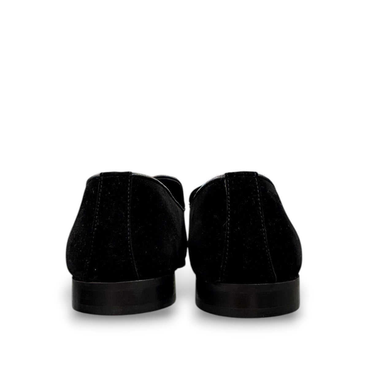 Sun Arash black suede slip-on loafers with subtle handmade stitching and a durable rubber outsole. Photo of back view.