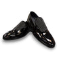 Sun Aron black patent leather loafer with handmade stitching and a durable rubber outsole. Photo of front view 1.