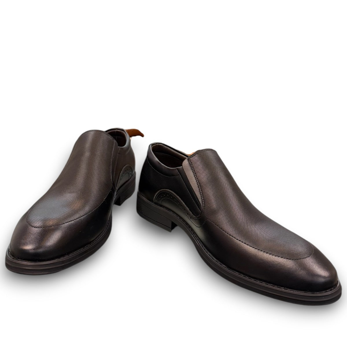 Sun Atar 2 black leather slip-on dress shoe with textured side panel and durable rubber outsole. Photo of front view.