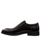 Sun Atar 2 black leather slip-on dress shoe with textured side panel and durable rubber outsole. Photo of inside side view.