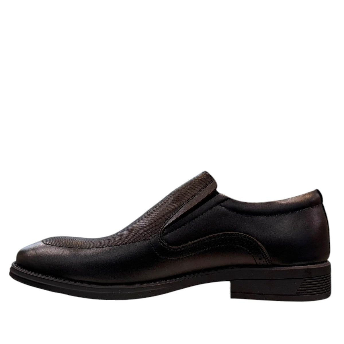 Sun Atar 2 black leather slip-on dress shoe with textured side panel and durable rubber outsole. Photo of inside side view.