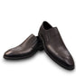 Sun Atar 2 black leather slip-on dress shoe with textured side panel and durable rubber outsole. Photo of upper view.