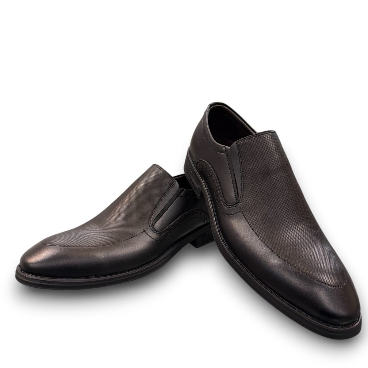 Sun Atar 2 black leather slip-on dress shoe with textured side panel and durable rubber outsole. Photo of upper view.