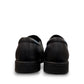 Sun Atar 2 black leather slip-on dress shoe with textured side panel and durable rubber outsole. Photo of back view.