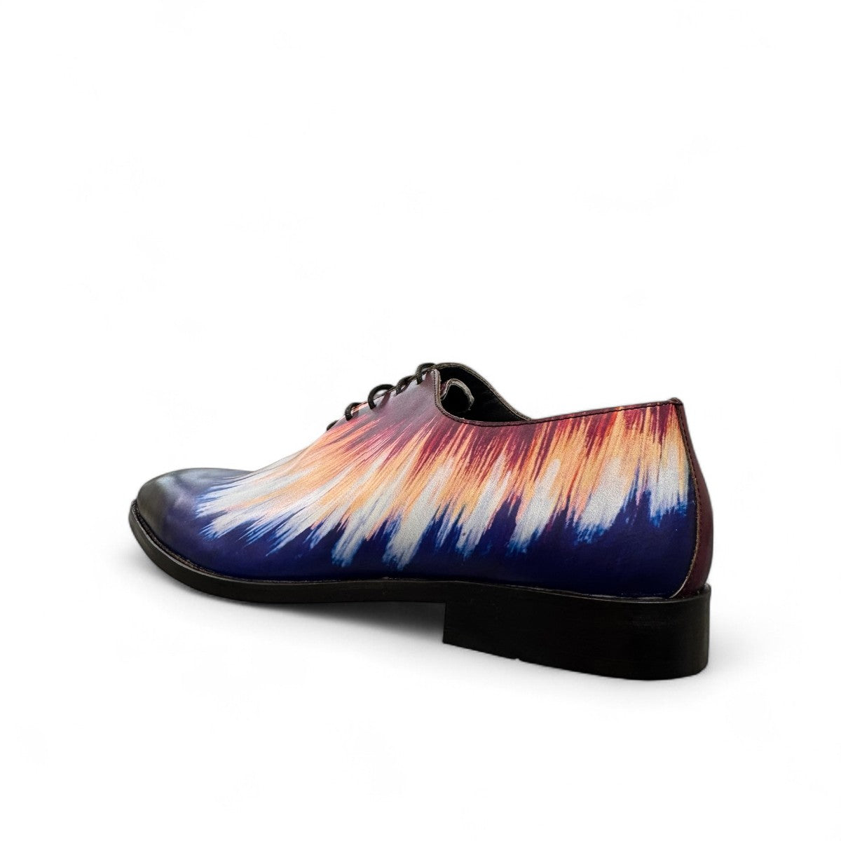 Sun Cool Watercolor handmade leather lace-up shoe with a vibrant sunset-inspired abstract print. Photo of back view from a side angle.