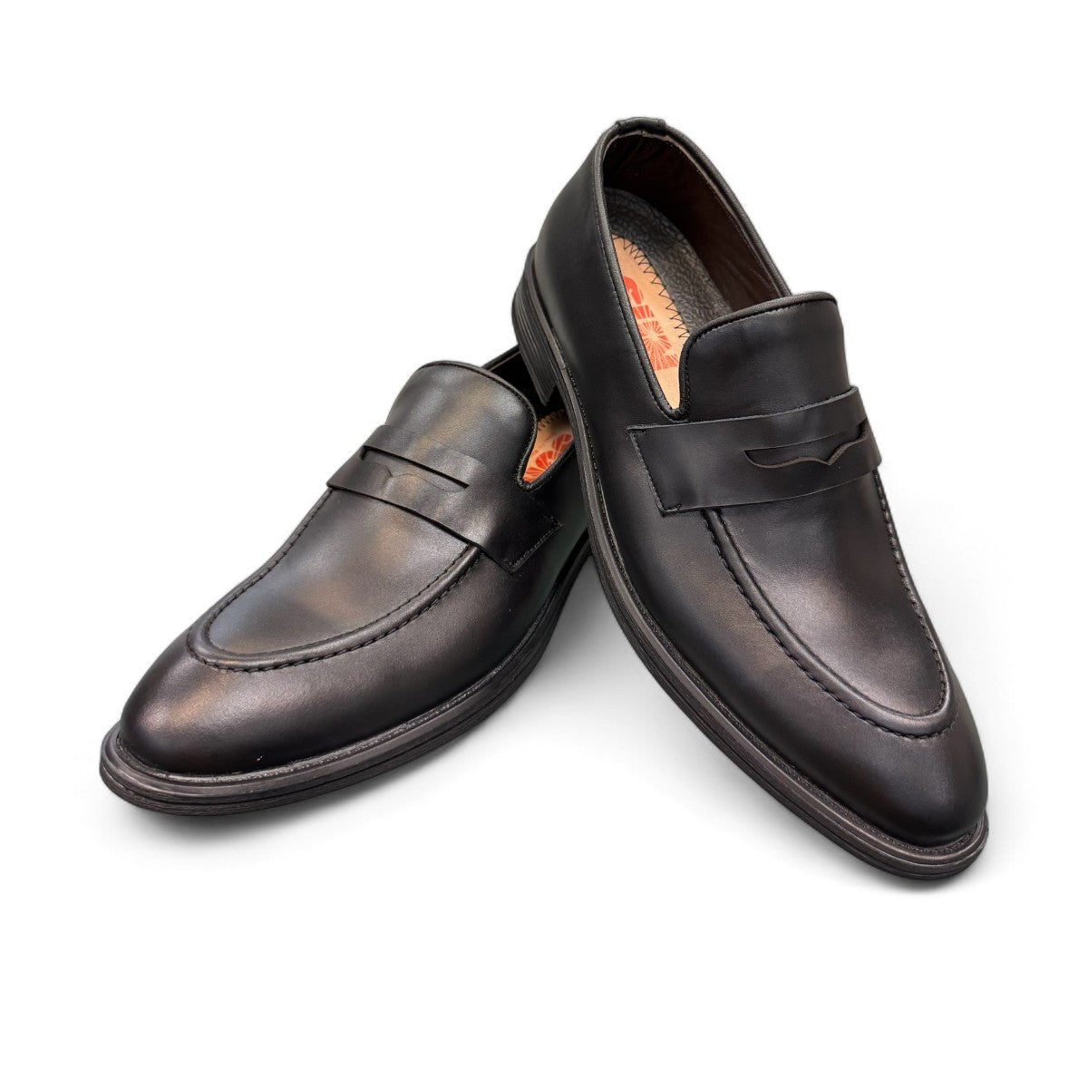 Sun Faulad black leather penny loafer with handmade stitching and durable rubber outsole. Photo of upper view.
