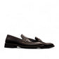 Sun Faulad black leather penny loafer with handmade stitching and durable rubber outsole. Photo of side views.