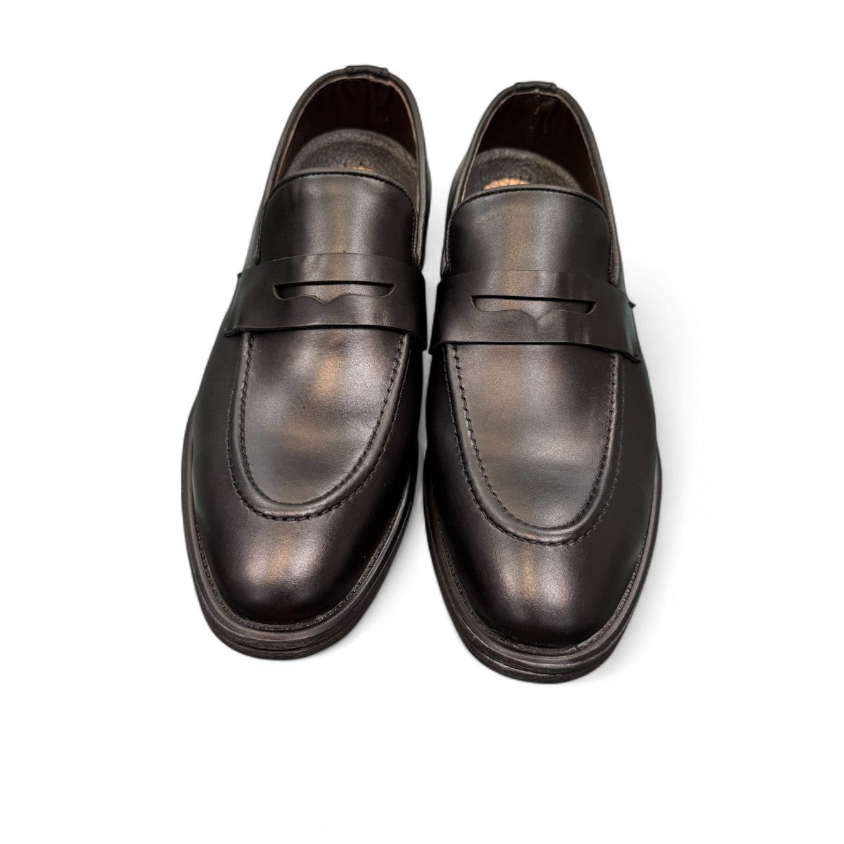 Sun Faulad black leather penny loafer with handmade stitching and durable rubber outsole. Photo of front view.