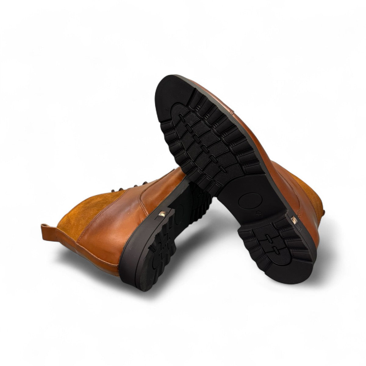 Sun Hesam brown leather lace-up boot with suede collar and durable rubber outsole. Photo of bottom view.