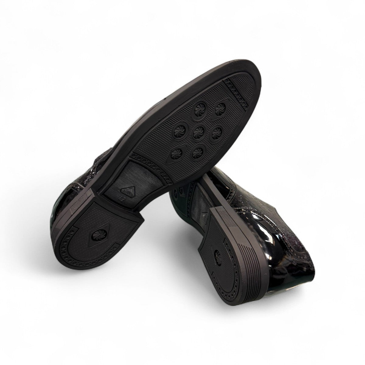 Sun Hesamak 2 black patent leather lace-up dress shoe with detailed stitching and rubber outsole. Photo of bottom view.