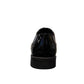 Sun Hesamak 2 black patent leather lace-up dress shoe with detailed stitching and rubber outsole. Photo of back view.