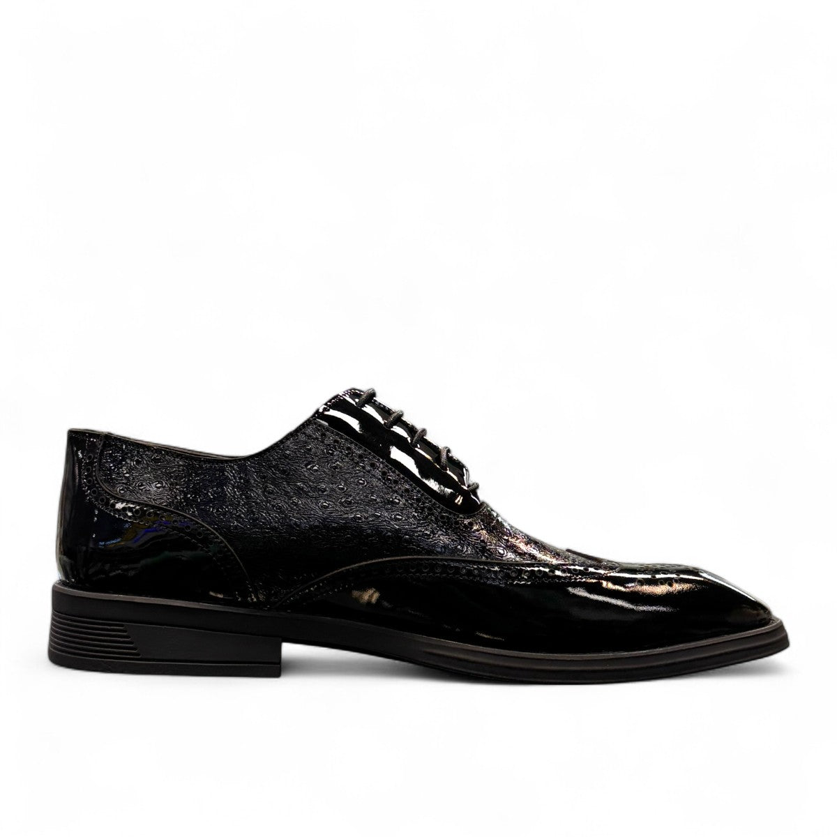 Sun Hesamak 2 black patent leather lace-up dress shoe with detailed stitching and rubber outsole. Photo of inside side view.