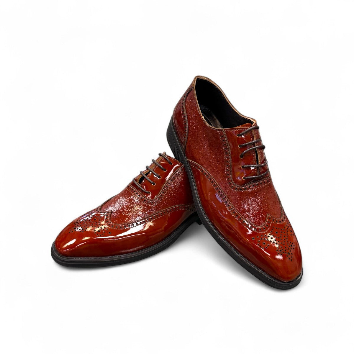Sun Hesamak 2 brown patent leather lace-up dress shoe with brogue detailing and a durable rubber outsole. Photo of upper view 1.