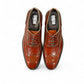 Sun Hesamak 2 brown patent leather lace-up dress shoe with brogue detailing and a durable rubber outsole. Photo of upper view 2.