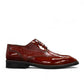 Sun Hesamak 2 brown patent leather lace-up dress shoe with brogue detailing and a durable rubber outsole. Photo of outside side view.