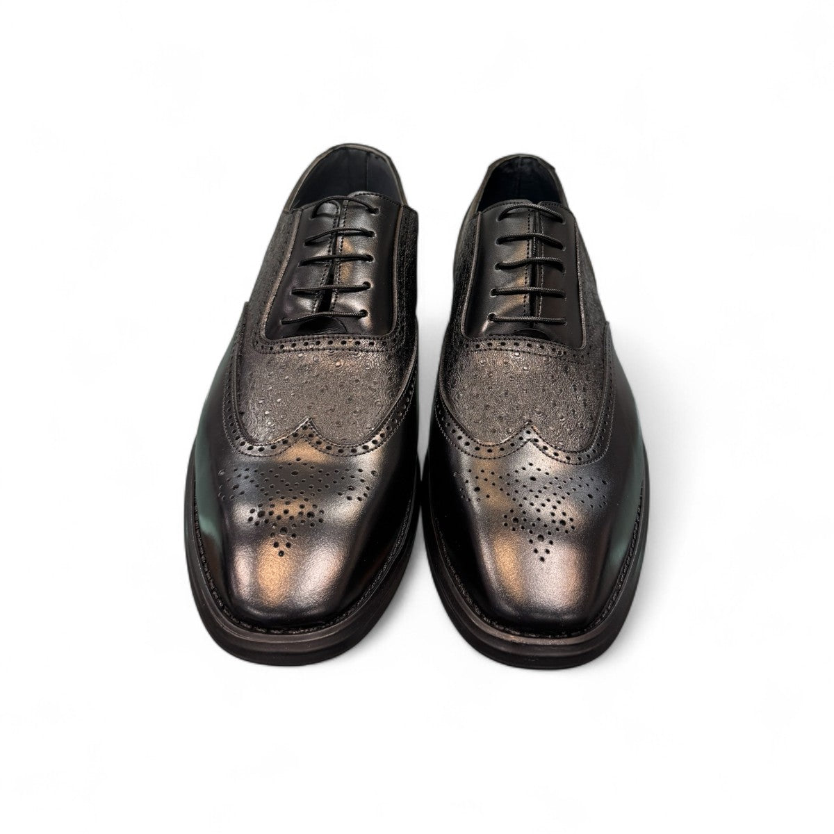 Sun Hesamak 3 black leather brogue dress shoe with lace-up closure and detailed stitching. Photo of front view 2.