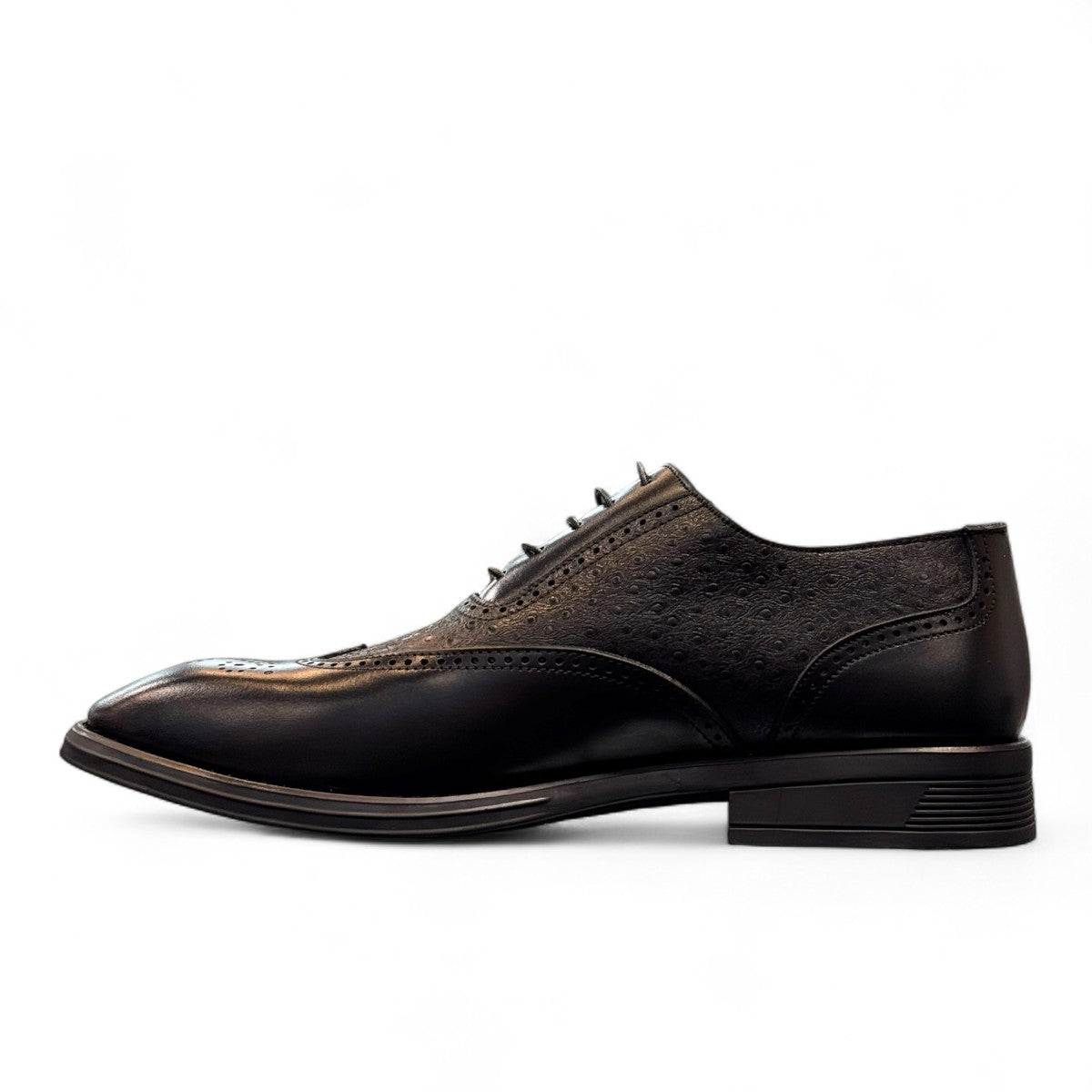 Sun Hesamak 3 black leather brogue dress shoe with lace-up closure and detailed stitching. Photo of inside side view.