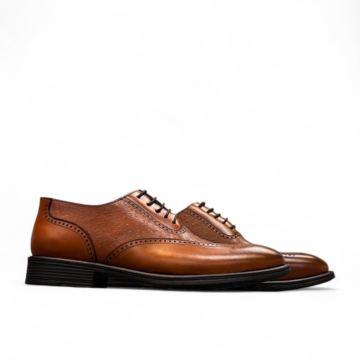 Sun Hesamak brown leather shoe with lace-up closure, textured side panel, and detailed stitching. Photo of side views.