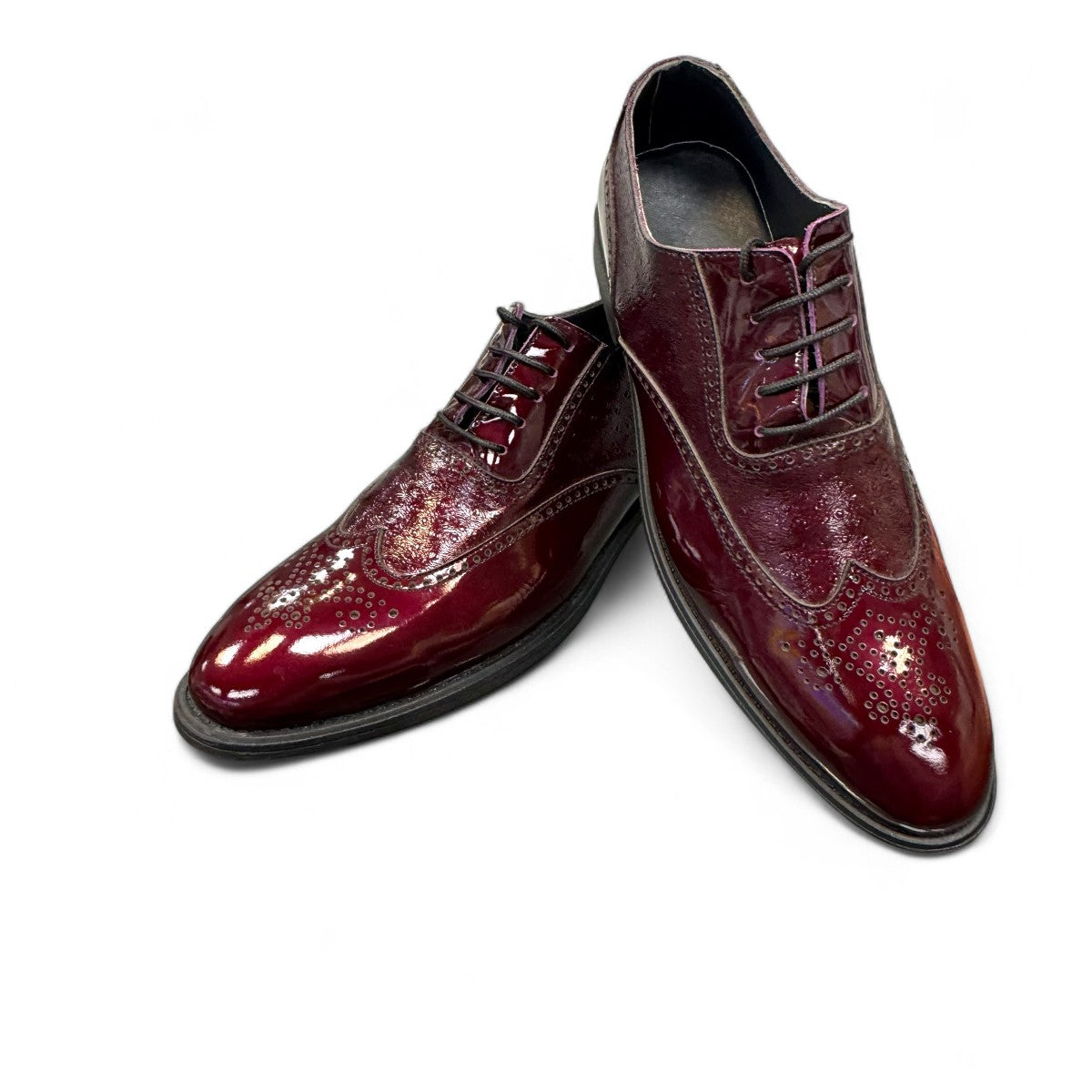 Sun Hesamak red leather brogue shoe with lace-up closure, polished finish, and durable rubber outsole. Photo of front view.