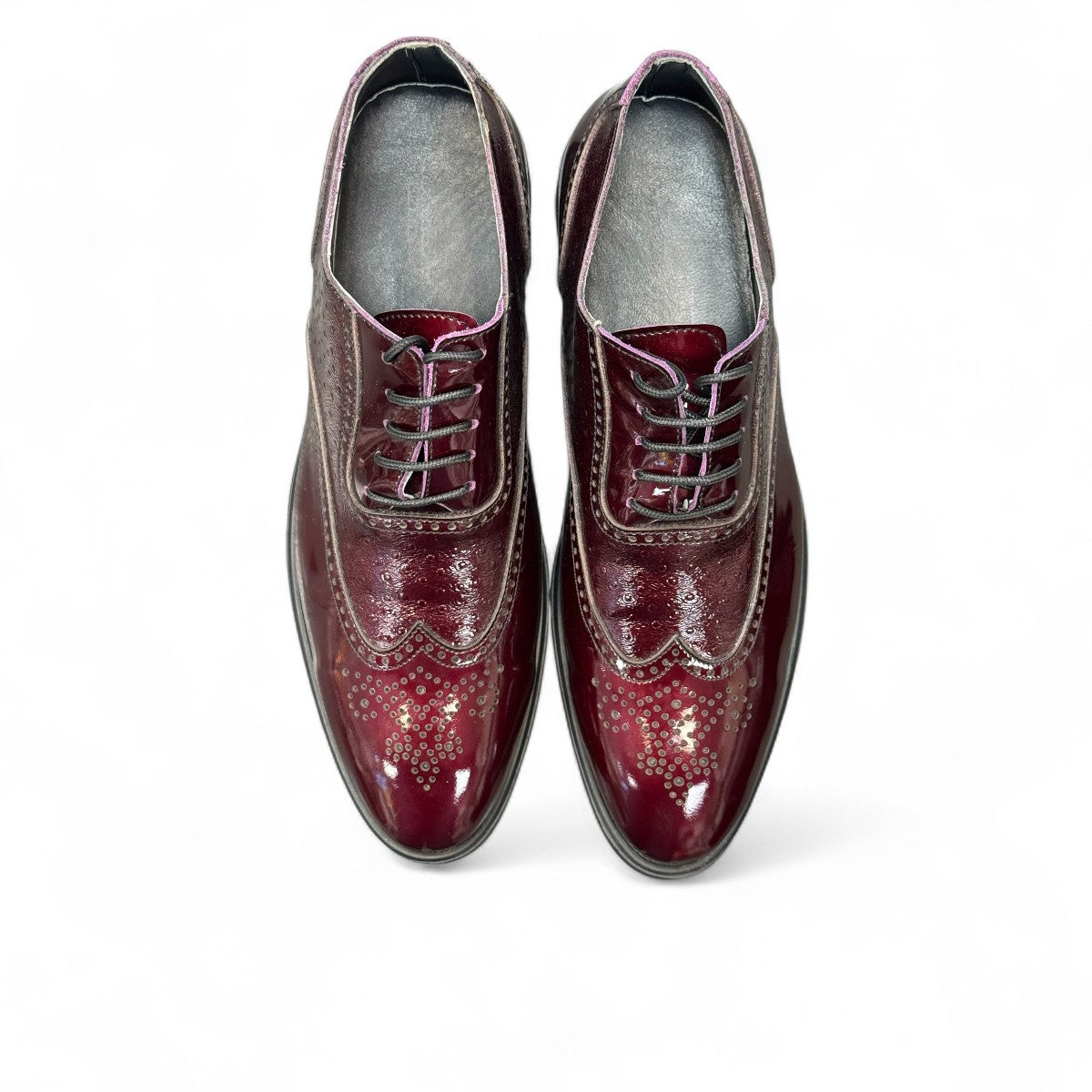 Sun Hesamak red leather brogue shoe with lace-up closure, polished finish, and durable rubber outsole. Photo of upper view.