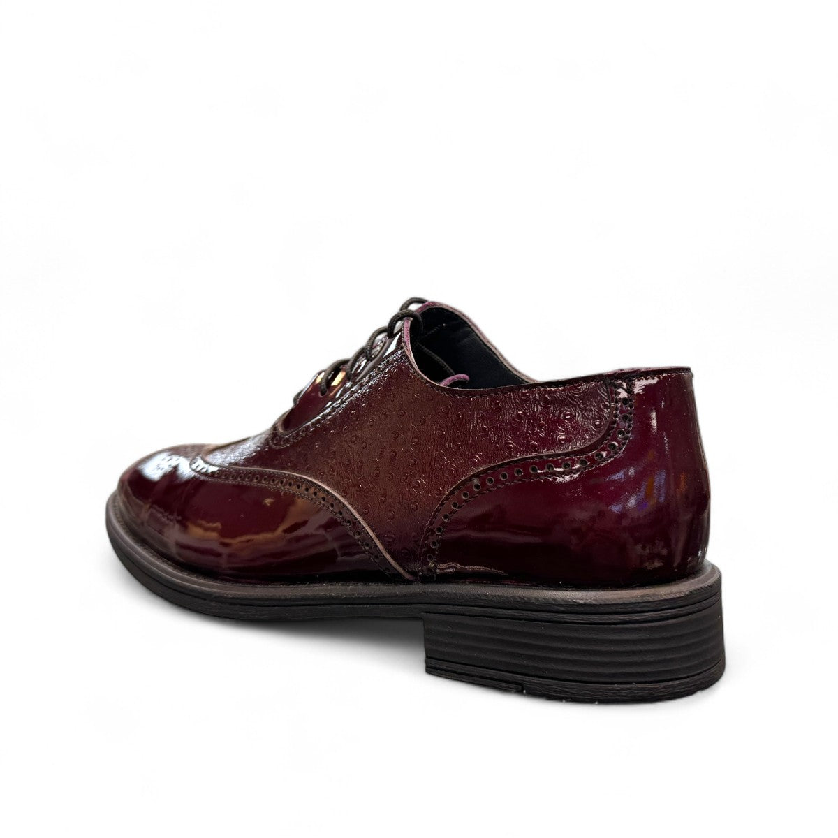 Sun Hesamak red leather brogue shoe with lace-up closure, polished finish, and durable rubber outsole. Photo of back view.