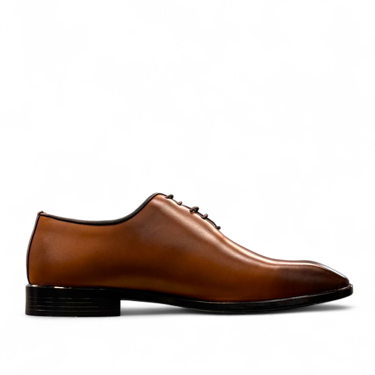 Sun Makan brown genuine leather lace-up formal dress shoe with a durable rubber outsole. Photo of inside side view.