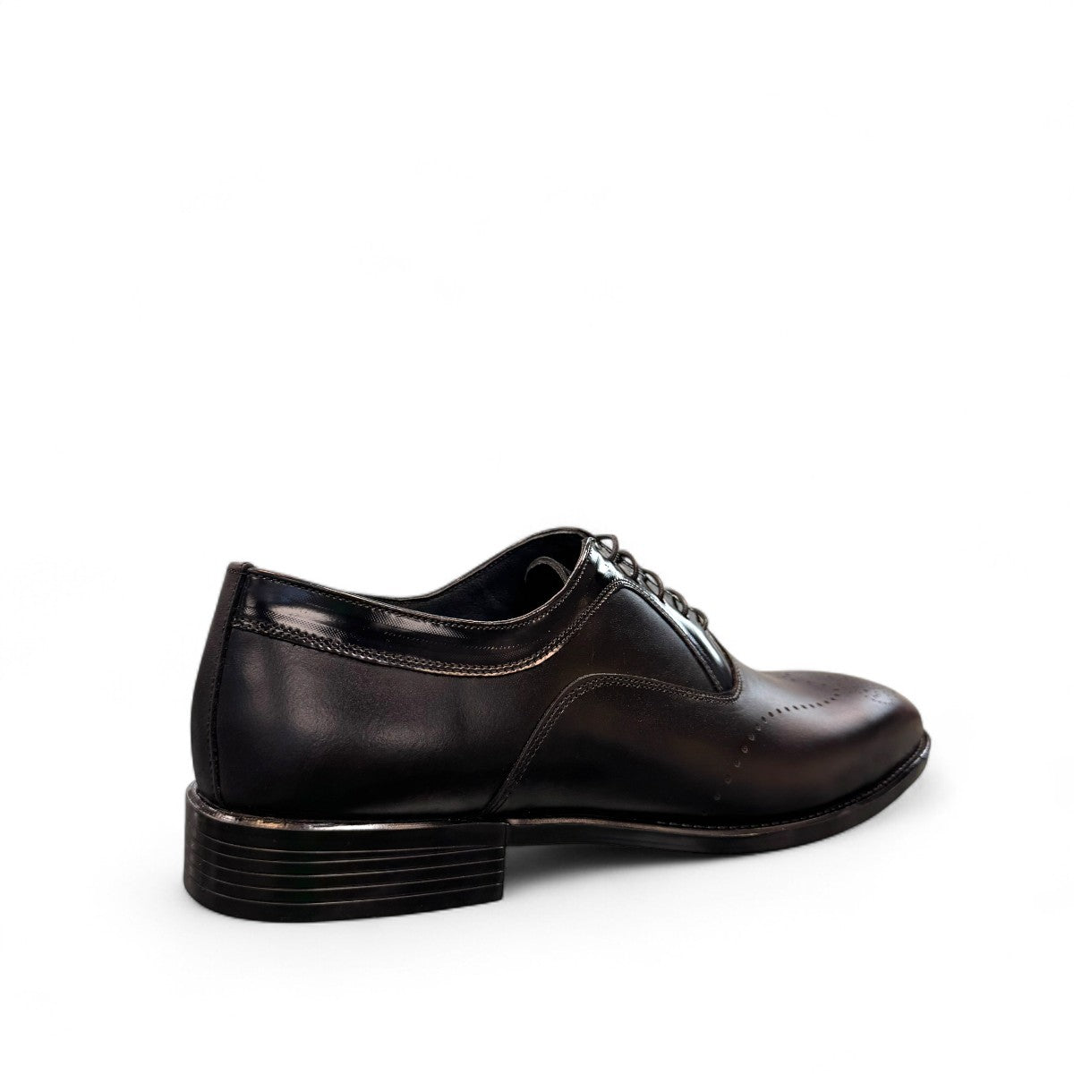 Sun Masiha black leather lace-up formal shoe with subtle handmade stitching and rubber outsole. Photo of back view at a side angle.