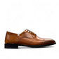 Sun Masiha brown leather lace-up dress shoe with brogue detailing and a durable rubber outsole. Photo of outside side view.