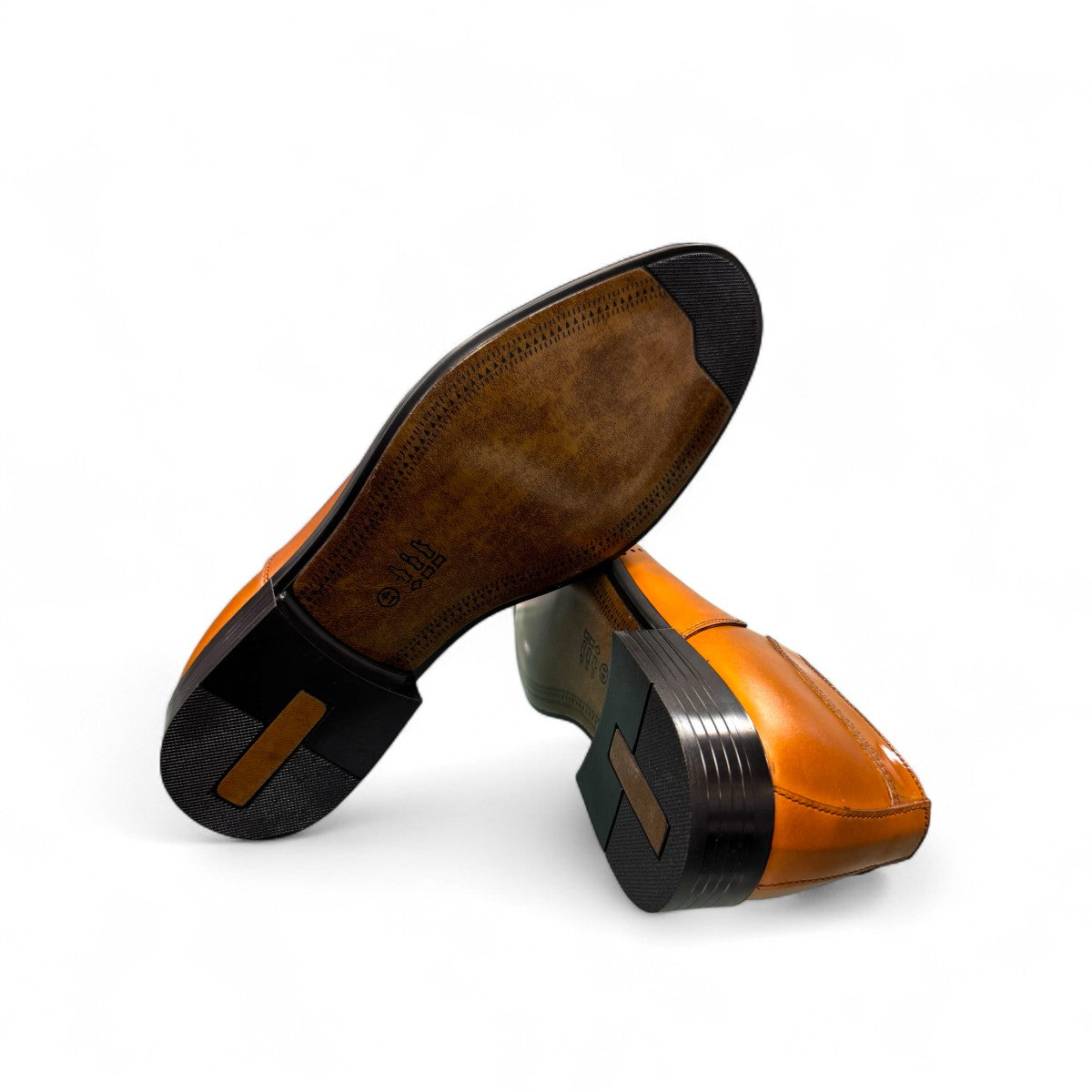 Sun Masiha brown leather lace-up dress shoe with brogue detailing and a durable rubber outsole. Photo of bottom view.
