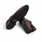 Sun Niko red patent leather lace-up dress shoe with textured detailing and durable rubber outsole. Photo of bottom view.