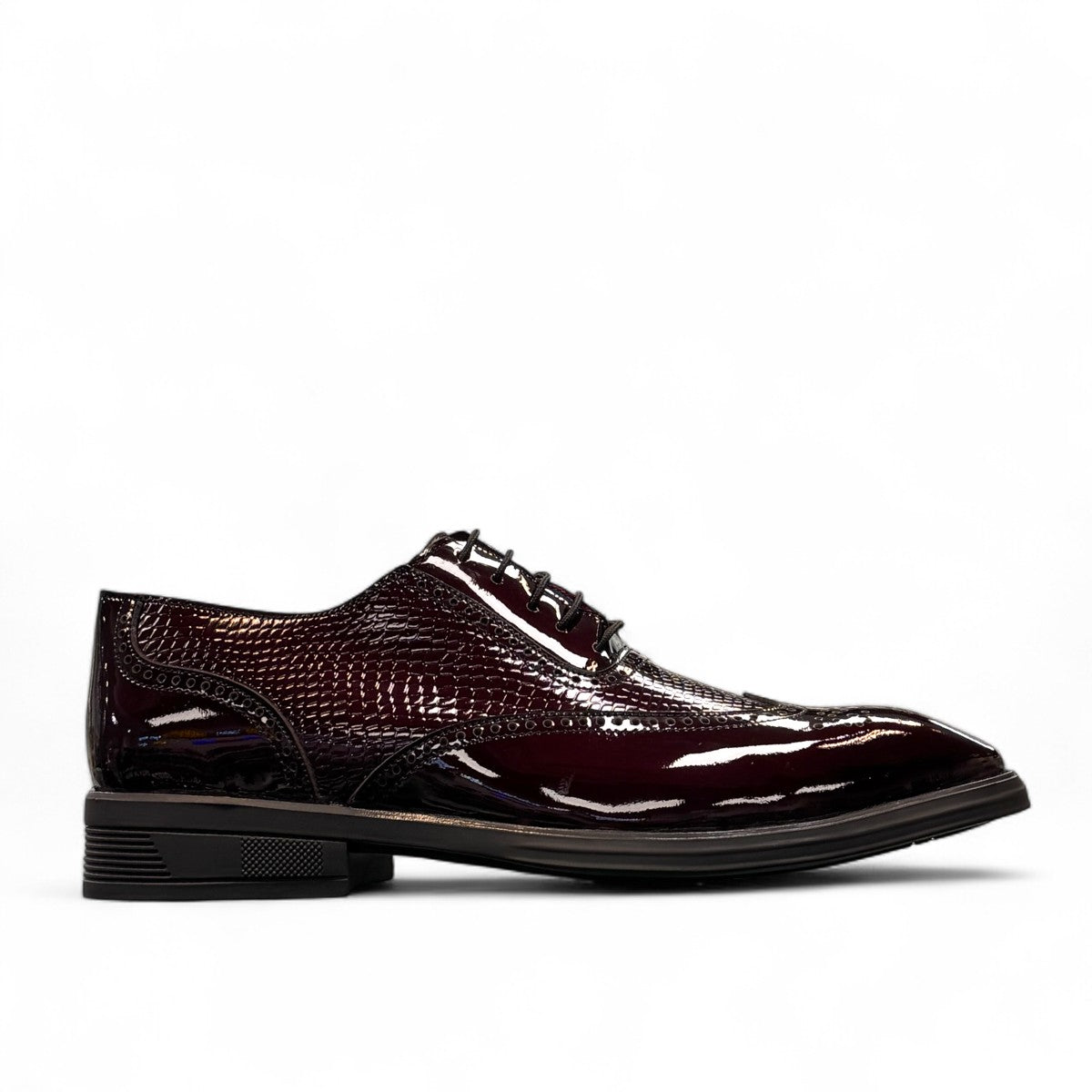 Sun Niko red patent leather lace-up dress shoe with textured detailing and durable rubber outsole. Photo of outside side view.