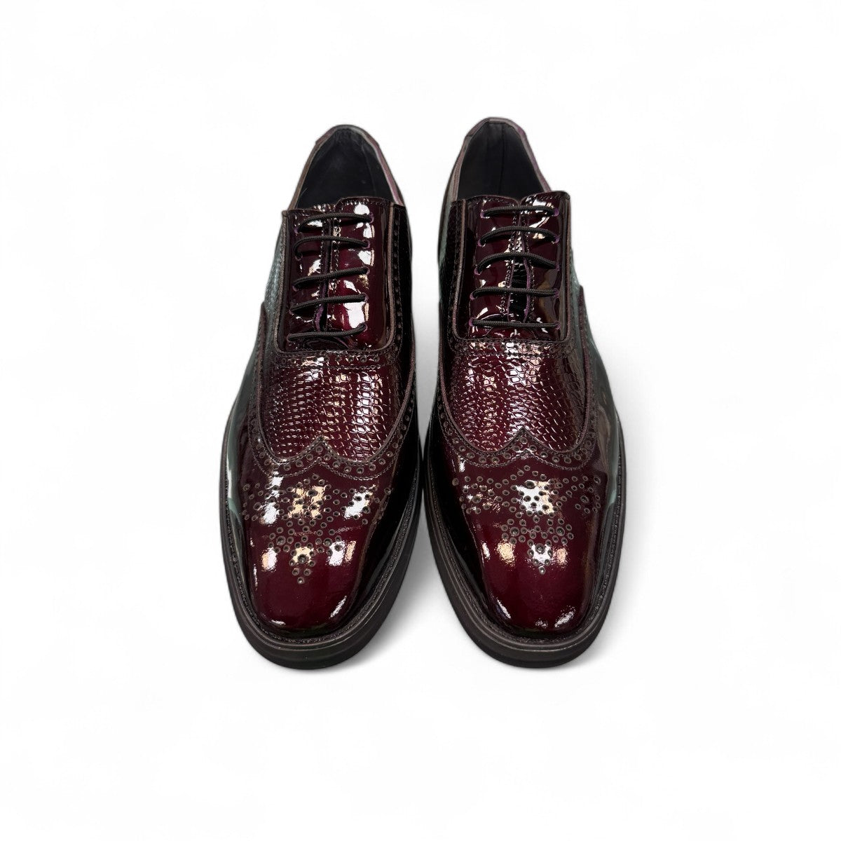 Sun Niko red patent leather lace-up dress shoe with textured detailing and durable rubber outsole. Photo of front view 2.