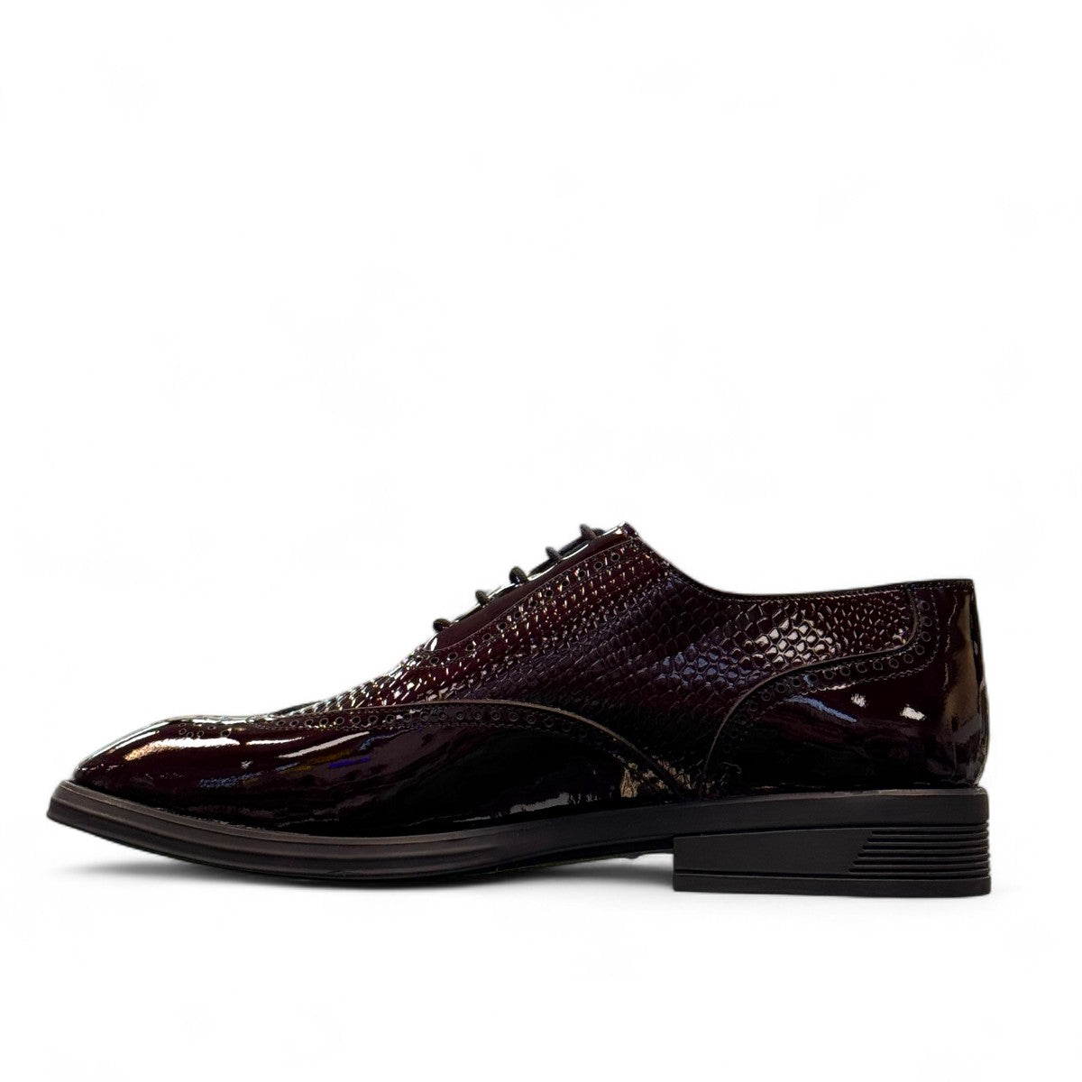 Sun Niko red patent leather lace-up dress shoe with textured detailing and durable rubber outsole. Photo of inside side view.