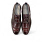 Sun Niko red patent leather lace-up dress shoe with textured detailing and durable rubber outsole. Photo of upper view.