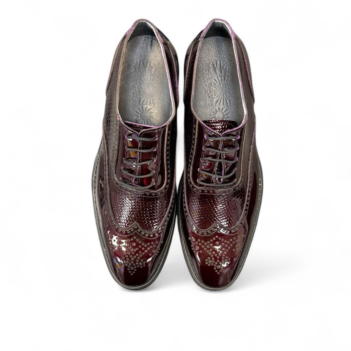 Sun Niko red patent leather lace-up dress shoe with textured detailing and durable rubber outsole. Photo of upper view.