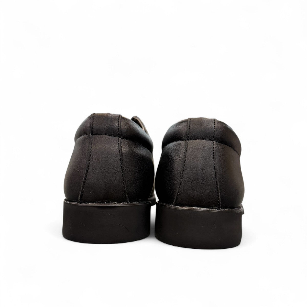 Sun Pourya black leather lace-up dress shoe with a durable rubber outsole and textured toe detail. Photo of back view 2.