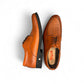Sun Pourya brown leather lace-up dress shoe with textured toe detail and durable rubber sole. Photo of upper view.
