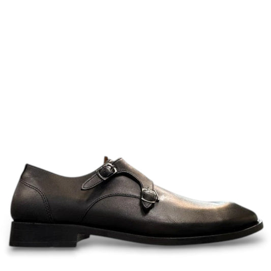 Sun Sahra black leather double monk strap shoes with handmade stitching and durable rubber outsole. Photo of outside side view.