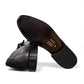 Sun Sahra black leather double monk strap shoes with handmade stitching and durable rubber outsole. Photo of bottom view.