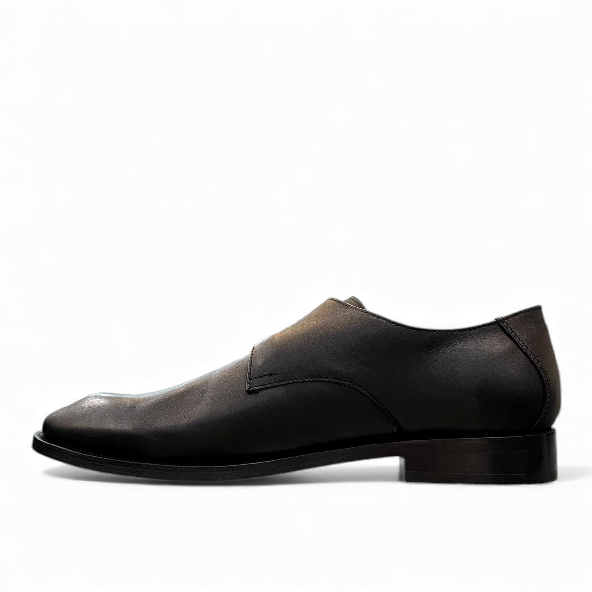 Sun Sahra black leather double monk strap shoes with handmade stitching and durable rubber outsole. Photo of inside side view.