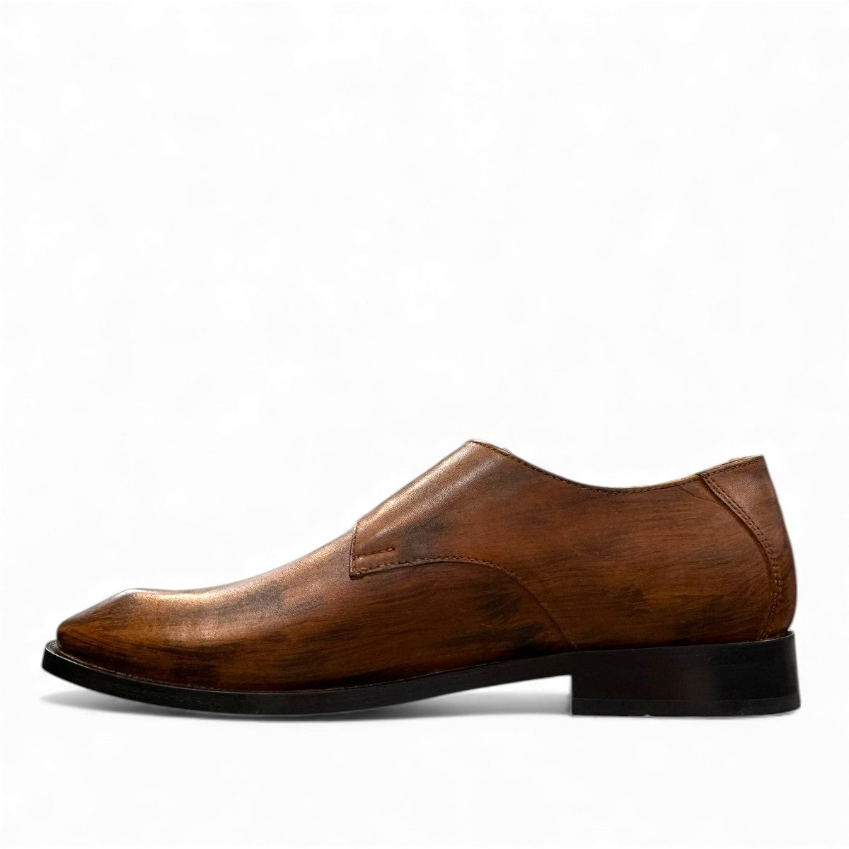 Sun Sahra brown leather monk strap shoe with handmade stitching and a durable rubber outsole. Photo of inside side view.