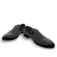 Sun Sparkling black suede loafers featuring sparkling rhinestone embellishments and refined handmade stitching. Photo of front view.