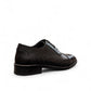 Sun Stylish black leather lace up dress shoe with textured pattern and handmade stitching details. Photo of back view from a side angle.