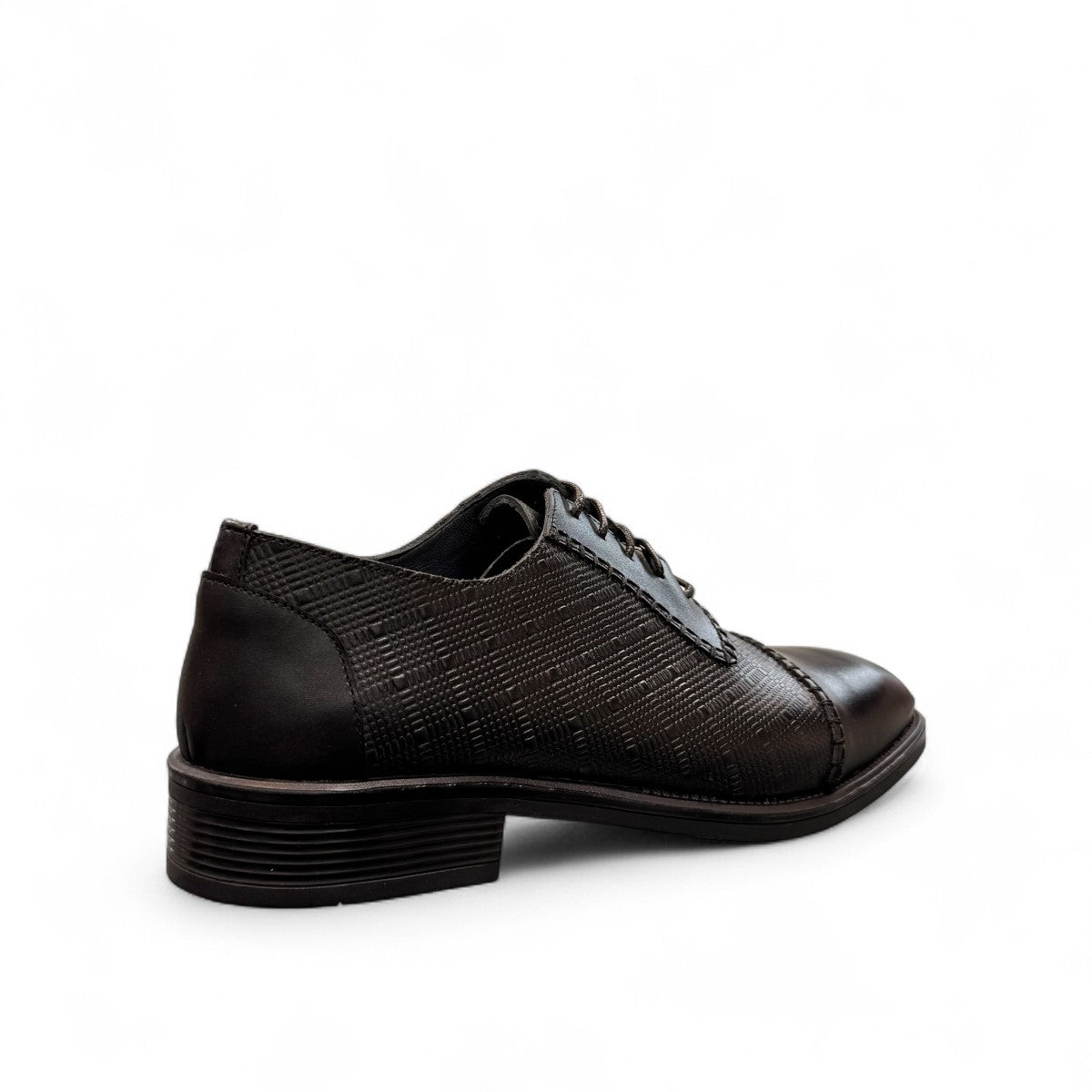 Sun Stylish black leather lace up dress shoe with textured pattern and handmade stitching details. Photo of back view from a side angle.