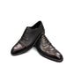 Sun Stylish black leather lace up dress shoe with textured pattern and handmade stitching details. Photo of upper view.