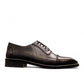 Sun Stylish black leather lace up dress shoe with textured pattern and handmade stitching details. Photo of outside side view.