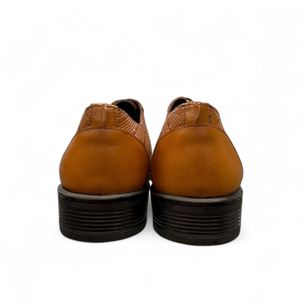 Sun Stylish brown leather lace up dress shoe with textured upper and detailed handmade stitching. Photo of back view.