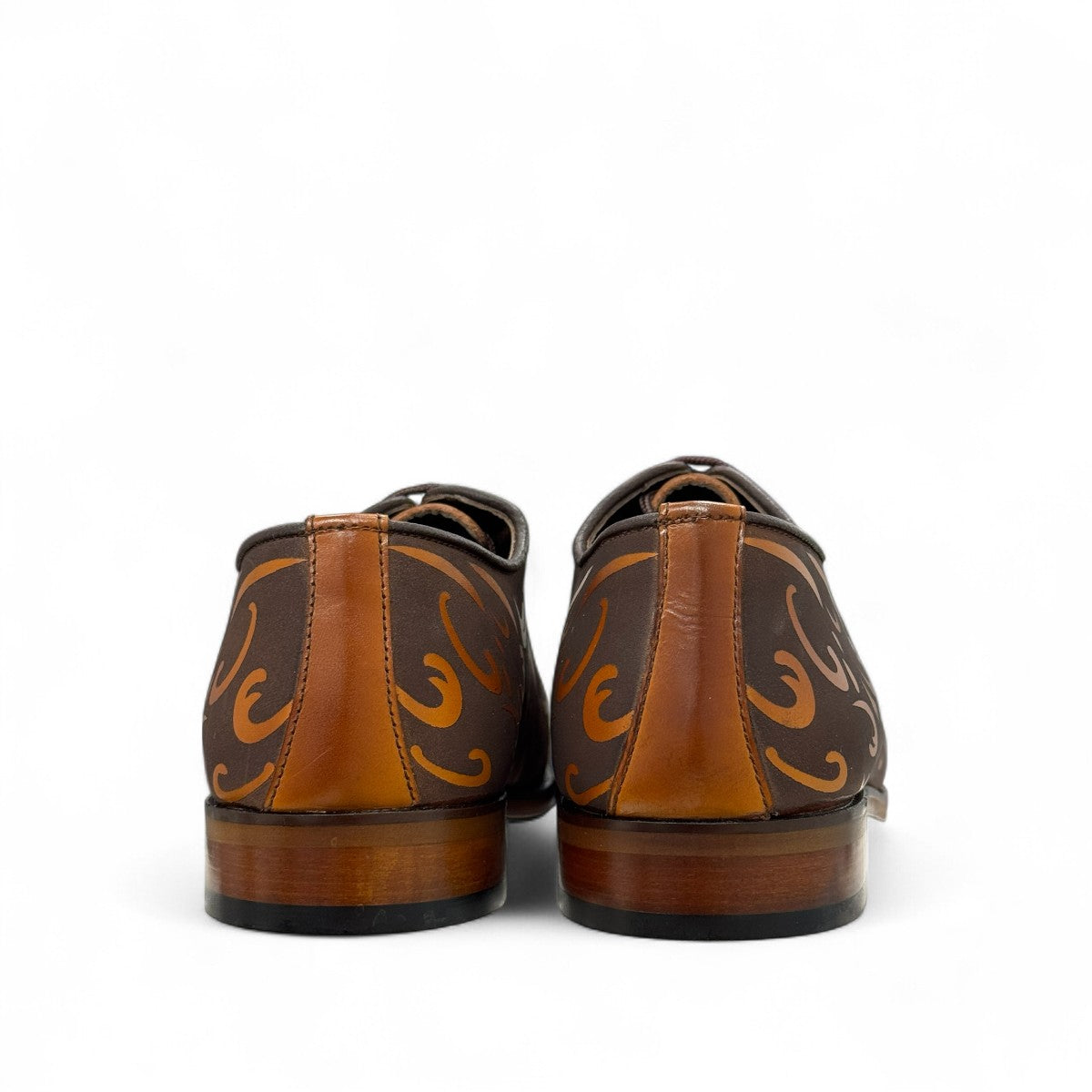 Sun Termeh brown leather and suede lace-up dress shoe with intricate hand-stitched swirl patterns. Photo of back view.
