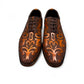 Sun Termeh brown leather and suede lace-up dress shoe with intricate hand-stitched swirl patterns. Photo of front view 2.